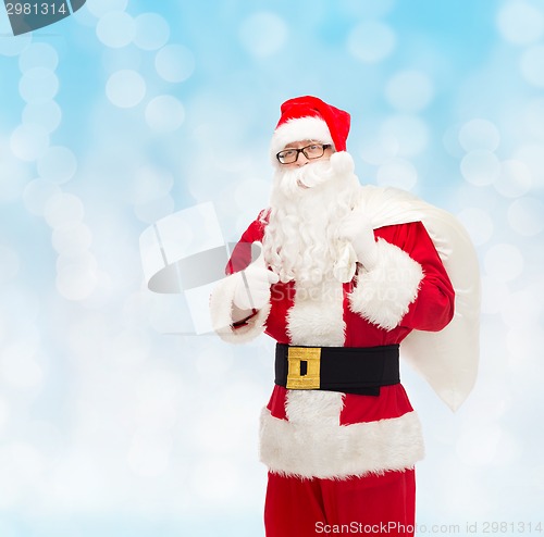 Image of man in costume of santa claus with bag