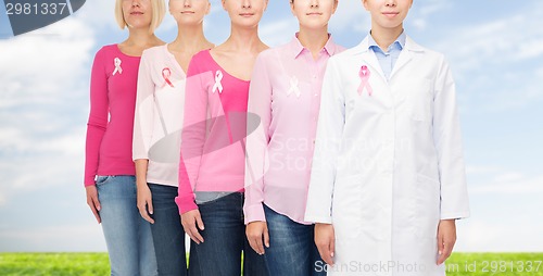 Image of close up of women with cancer awareness ribbons