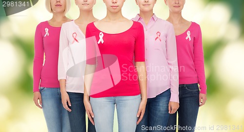 Image of close up of women with cancer awareness ribbons