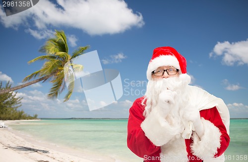 Image of man in costume of santa claus with bag