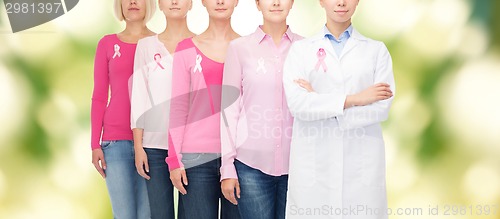 Image of close up of women with cancer awareness ribbons