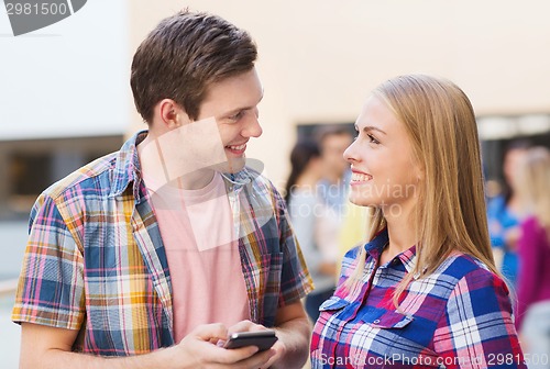 Image of group of smiling students outdoors