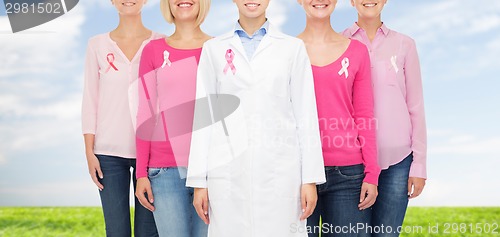 Image of close up of women with cancer awareness ribbons