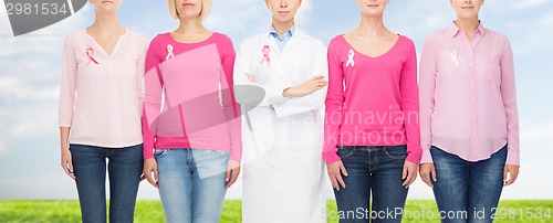 Image of close up of women with cancer awareness ribbons