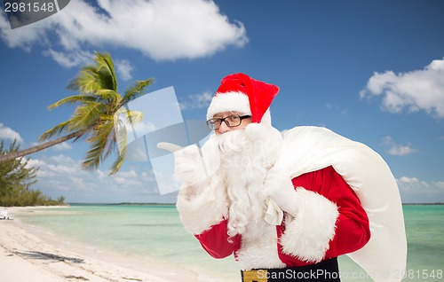 Image of man in costume of santa claus with bag