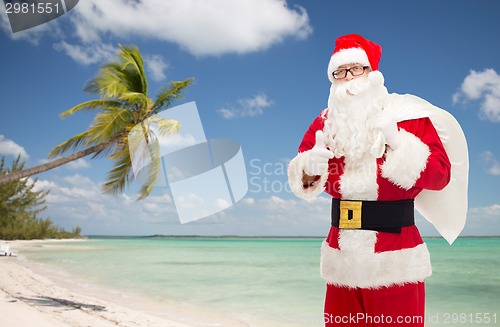 Image of man in costume of santa claus with bag