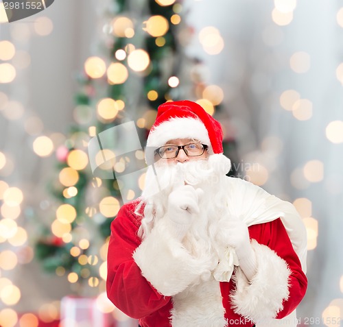 Image of man in costume of santa claus with bag