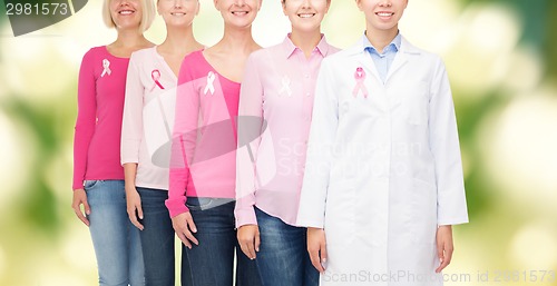 Image of close up of women with cancer awareness ribbons