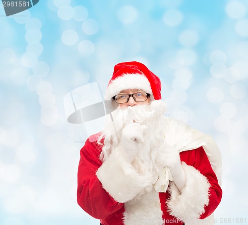 Image of man in costume of santa claus with bag