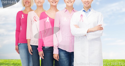 Image of close up of women with cancer awareness ribbons