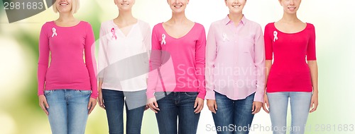 Image of close up of women with cancer awareness ribbons