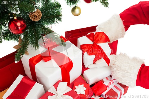 Image of close up of santa claus with presents