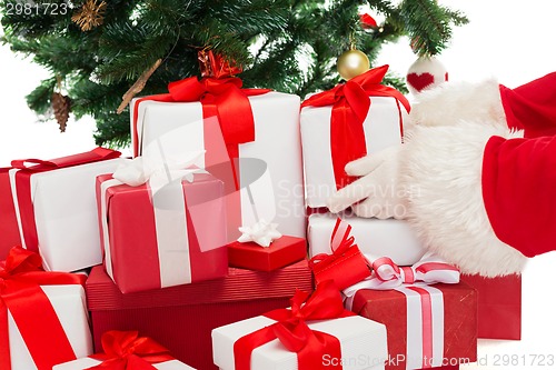 Image of close up of santa claus with presents