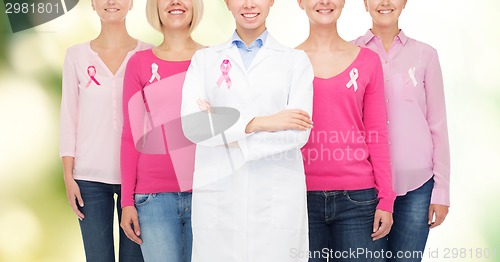 Image of close up of women with cancer awareness ribbons