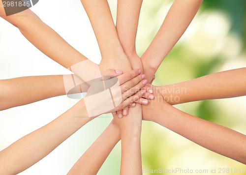 Image of close up of hands on top