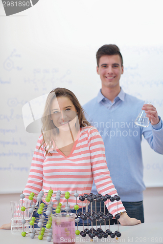 Image of happy teens group in school