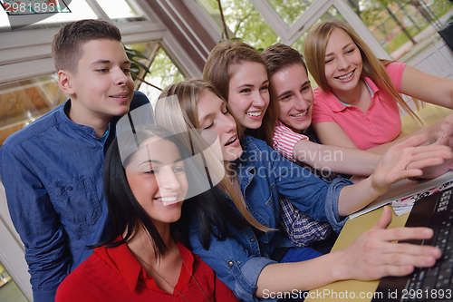 Image of happy teens group in school