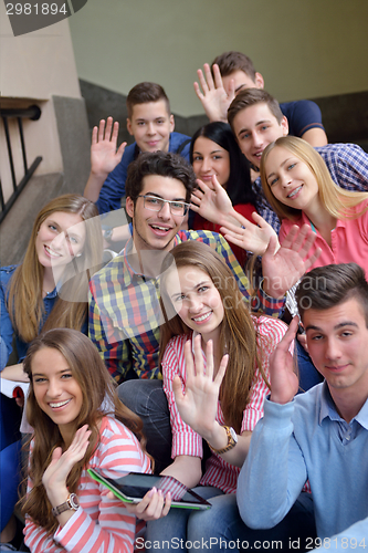 Image of happy teens group in school