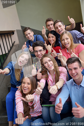 Image of happy teens group in school