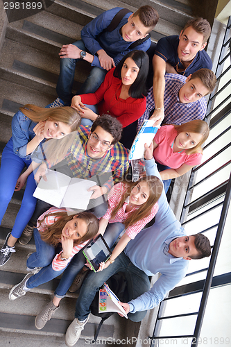 Image of happy teens group in school