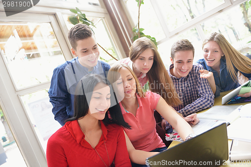 Image of happy teens group in school