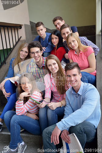 Image of happy teens group in school