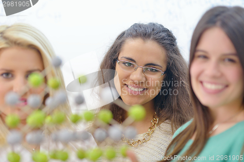 Image of happy teens group in school