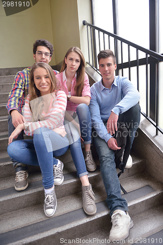 Image of happy teens group in school