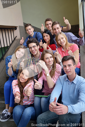 Image of happy teens group in school