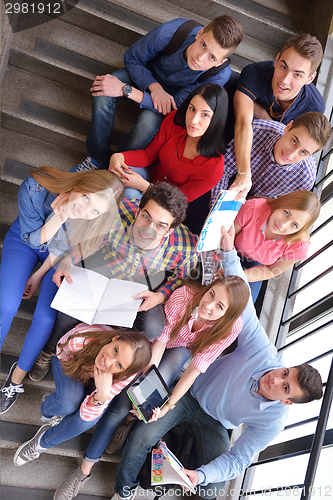 Image of happy teens group in school