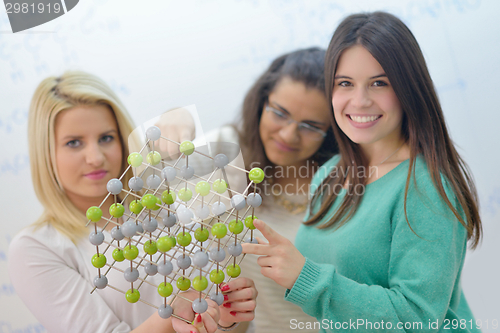 Image of happy teens group in school