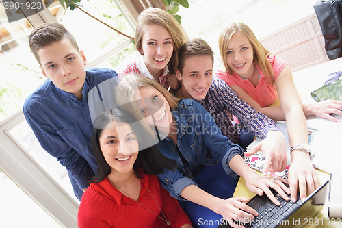 Image of happy teens group in school