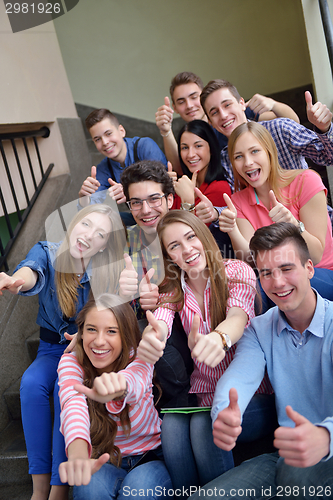 Image of happy teens group in school
