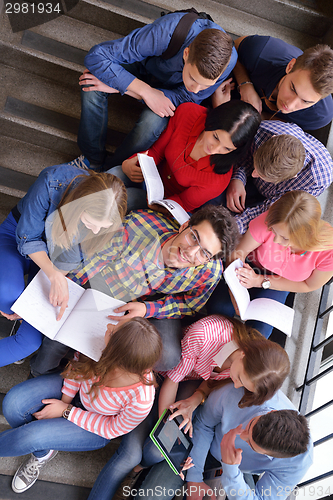 Image of happy teens group in school