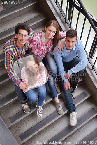 Image of happy teens group in school