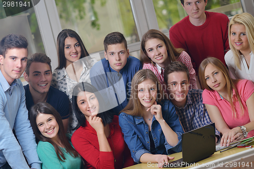 Image of happy teens group in school