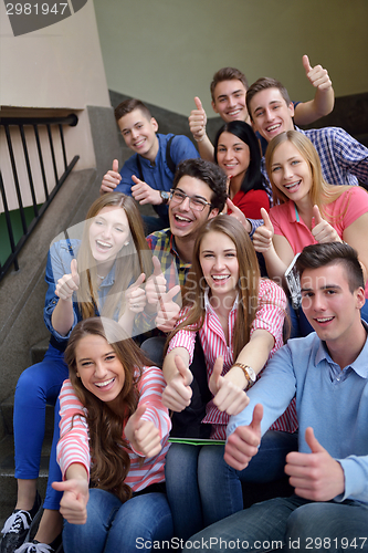 Image of happy teens group in school