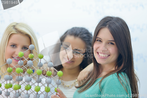 Image of happy teens group in school