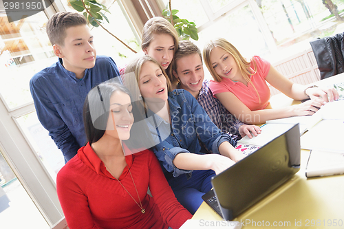 Image of happy teens group in school