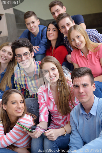 Image of happy teens group in school