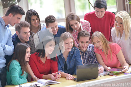 Image of happy teens group in school