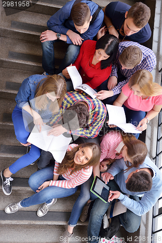 Image of happy teens group in school