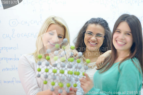 Image of happy teens group in school