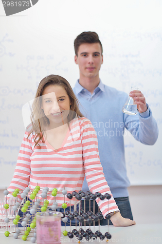 Image of happy teens group in school