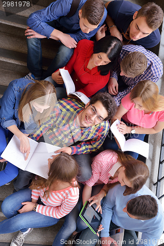 Image of happy teens group in school