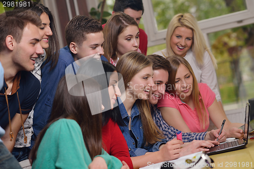 Image of happy teens group in school