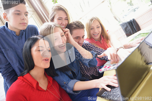 Image of happy teens group in school