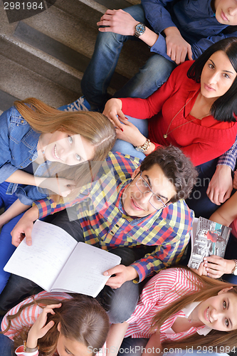 Image of happy teens group in school