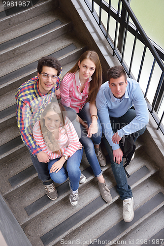 Image of happy teens group in school