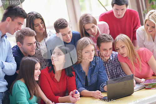 Image of happy teens group in school